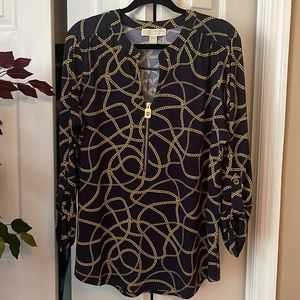 Gorgeous Michael Kors shirt. Brass accent on zipper and buttons. Roll up sleeves